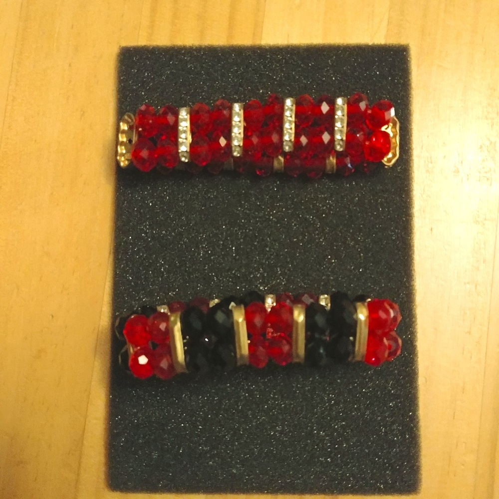 Red, black and gold beaded bracelets